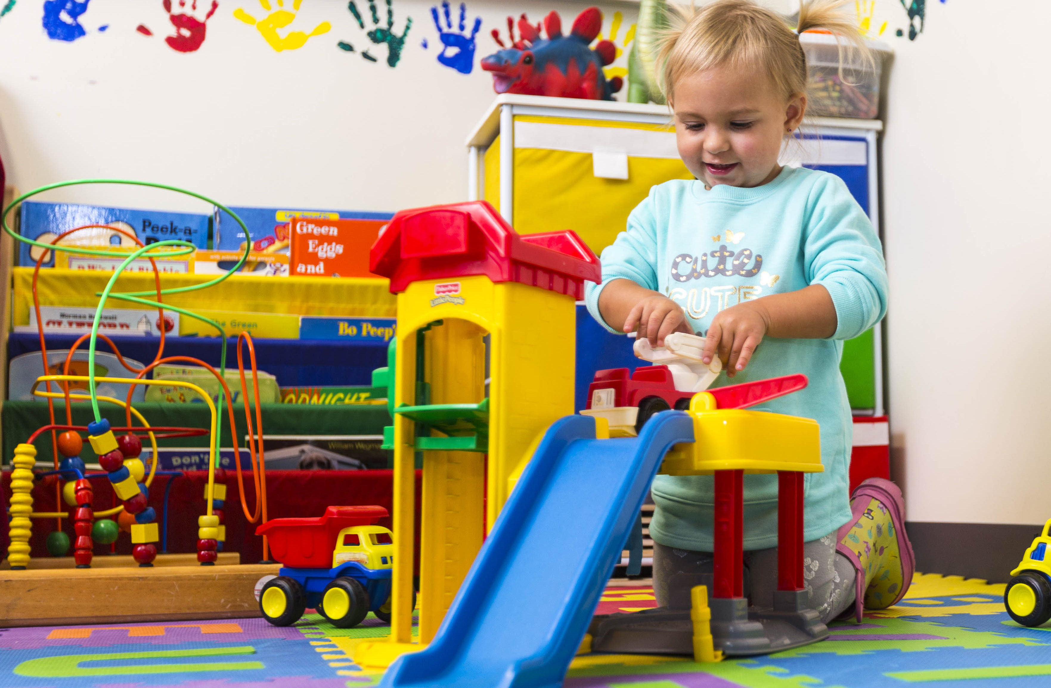 A child plays with toys in the lab.